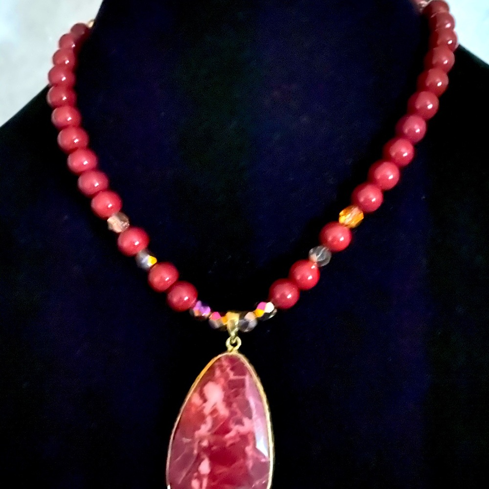 Necklace with matching earrings and pendant